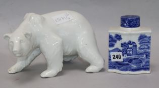 A Berlin porcelain bear, 25cm. and a Copeland tea canister