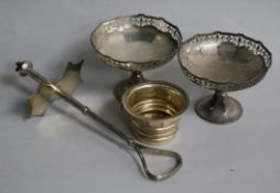 A pair of silver pedestal bonbon dishes, the straining section of a Georgian silver wine funnel &