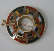 A late 19th/early 20th century Scottish yellow metal and hardstone circular brooch, 55mm.