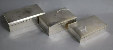 Three engine-turned silver cigarette boxes