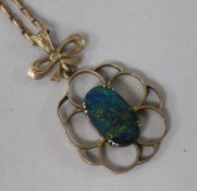 A 9ct gold and opal doublet pendant on a 9ct gold chain.