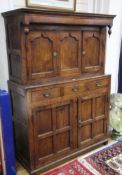 An 18th century oak cupboard W.123cm