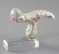 A Meissen 'Frauen Kopf' cane handle, 19th century, painted with floral sprays, unmarked, length