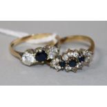 A 9ct gold, sapphire and diamond three-stone ring and a sapphire and diamond cluster ring