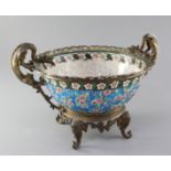 A Longwy chinoiserie ormolu mounted bowl, late 19th century, the interior decorated with floral