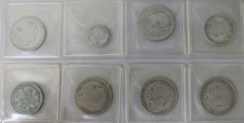 A collection of UK silver and copper coinage, including two 1797 twopence cartwheels, NF and F