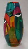 A Picasso-inspired Art Glass vase by Bilbo, decorated with a multi-coloured abstract face design,
