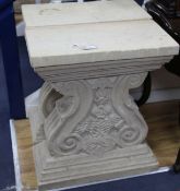 A pair of carved stone shaped columns W.64cm