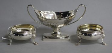 A George III silver boat-shaped salt, London 1788, Robert Hennell I and a pair of silver bun