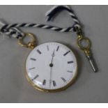 A yellow metal fob watch with Roman dial.