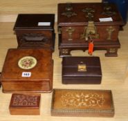 Four treen boxes and two leather boxes