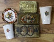 Three commemorative tins