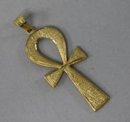 An Egyptian yellow metal (tests as 18ct gold) engraved Ankh pendant.