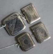 Four Victorian/Edwardian silver vesta cases, variously engraved and engine-turned, two initialled,