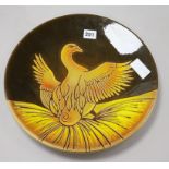 A Poole pottery Aegean pattern charger, painted with a bird by D.Davis 35cm.