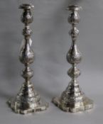 A pair of George V silver sabbath day candlesticks, by Sigmund Zyto, London, 1923, 34cm, weighted.
