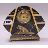 A black and amber art deco marble clock with bronze lion mount 15.5 x 19cm