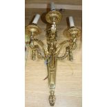 An ormolu three branch wall light height 55cm