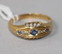 An early 20th century 18ct gold and gem set ring, size L.