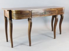 A Regency ebony strung mahogany serving table, of breakfront form, with three drawers and acanthus