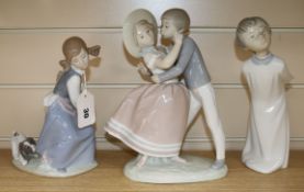 A Lladro figure group, 'Precious Love', another of a girl with basket and dog and a Zaphir figure of