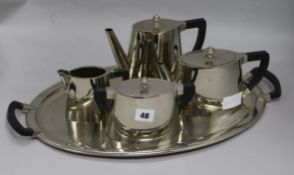 A 4-piece art deco tea set and tray W.52cm