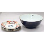 A Chinese gilt decorated powder blue bowl and two Chinese Imari plates, 18th century and a