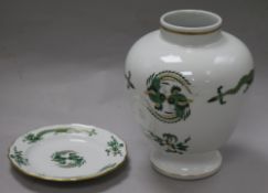 A Meissen Opulent Court Dragon vase, green colourway heightened in gilt and a similar plate, the