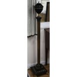 A bronzed candle stand W.37cm at base