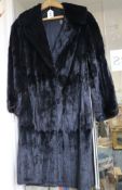 A black full length mink coat