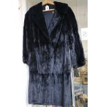 A black full length mink coat