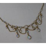 A 9ct gold and opal fringe necklace, 44cm.