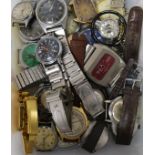 A Mickey Mouse watch and various other wrist watches.