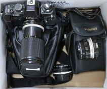 A Nikon F.301 camera, with Nikon SB-18 flash gun, a 70-120mm telescopic lens, one other lens and a