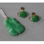 A pair of yellow metal and jade ear clips and a simulated jade pendant.