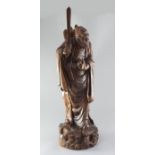 A large Chinese hardwood figure of Lu Dongbin, late 19th/early 20th century, height 71cm,