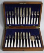 A cased set of 1920's mother of pearl handled silver dessert eaters.