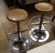 A pair of vintage kitchen stools