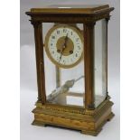 A Maple & Co ormolu four glass mantel clock 33cm.