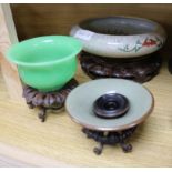 Three Chinese hardwood stands and three bowls