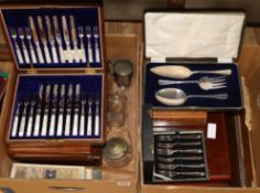 A collection of plated canteens of cutlery