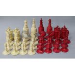 A carved and stained bone chess set