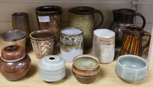 A group of studio pottery jugs and beakers
