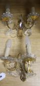 A pair of French gilt and cut glass wall lights