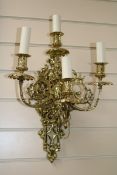 A pair of Victorian gilt brass four branch wall lights, re-wired for electricity H.42cm