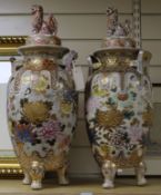 A pair of Japanese Satsuma pottery vases and cover 57cm.