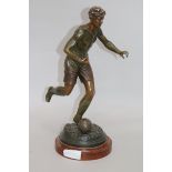 An early 20th century spelter model of a footballer 40cm.