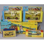 A Corgi Car Transporter No. 1138, boxed with diorama and four other boxed vehicles, including two