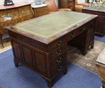 An Edwardian mahogany pedestal desk W.153cm