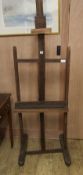 An artist's easel (a/f) W.60cm